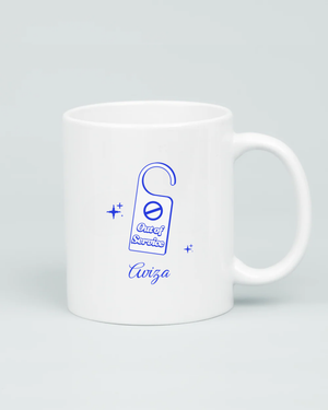 Back view of Aviza blue graphic mug featuring a 'Do Not Disturb' door hanger sign with stars and the cursive Aviza brand logo.