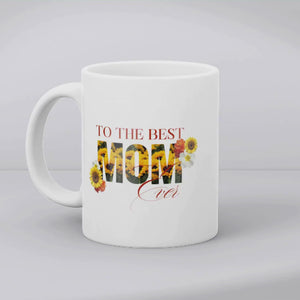 Aviza Best Mom Ever Sunflower Mug featuring the word 'MOM' filled with vibrant yellow sunflowers and elegant script on a white ceramic base.