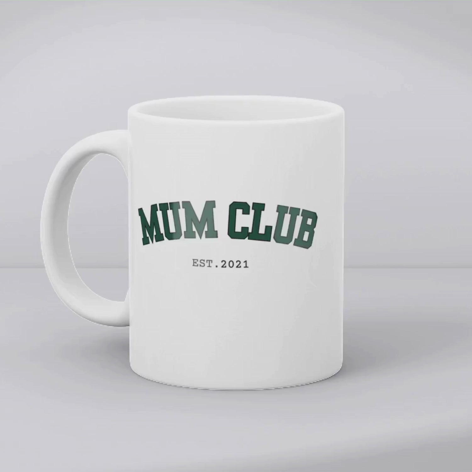 Aviza Custom Mum Club Mug featuring a dark green varsity-style font and personalized 'Est. 2021' text on a premium white ceramic base.